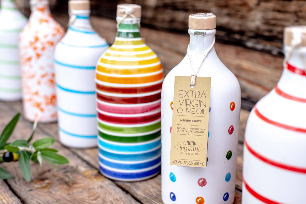 Italian extra virgin olive oil in a ceramic "Rainbow" bottle and gift box "Muraglia INTENSE FRUITY" 500 ml (intensely fruity)
